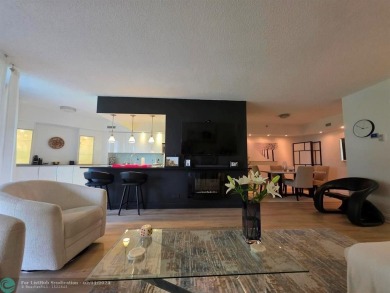 Gorgeous Spacious Remodeled 1bd +Den, 2ba corner unit in Environ on Inverrary Country Club in Florida - for sale on GolfHomes.com, golf home, golf lot