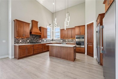 Welcome to this stunning, like-new, custom-built walkout on The Wilds Golf Club in Minnesota - for sale on GolfHomes.com, golf home, golf lot