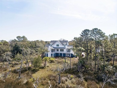 Southern charm meets coastal elegance in this beautifully on Wild Dunes Harbor Golf Resort in South Carolina - for sale on GolfHomes.com, golf home, golf lot