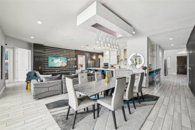 Welcome to 13136 Alderley Drive - a luxurious 5-bedroom, 5-bath on Eagle Creek Golf Club in Florida - for sale on GolfHomes.com, golf home, golf lot