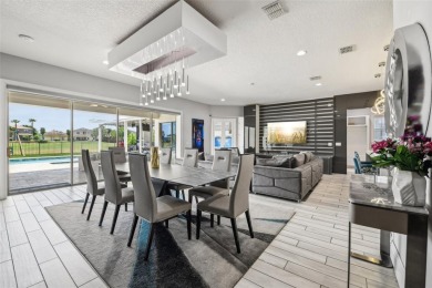 Welcome to 13136 Alderley Drive - a luxurious 5-bedroom, 5-bath on Eagle Creek Golf Club in Florida - for sale on GolfHomes.com, golf home, golf lot