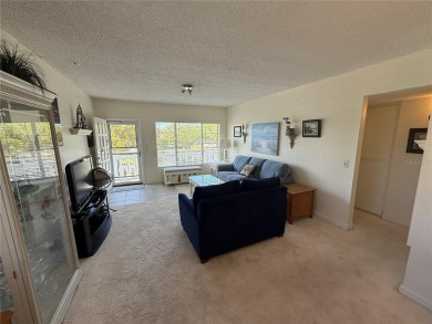 LIGHT AND BRIGHT! 3RD FLOOR, END UNIT WITH PRIME LOCATION! on On Top Of The World Golf Course in Florida - for sale on GolfHomes.com, golf home, golf lot