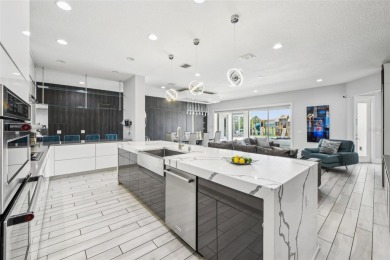 Welcome to 13136 Alderley Drive - a luxurious 5-bedroom, 5-bath on Eagle Creek Golf Club in Florida - for sale on GolfHomes.com, golf home, golf lot