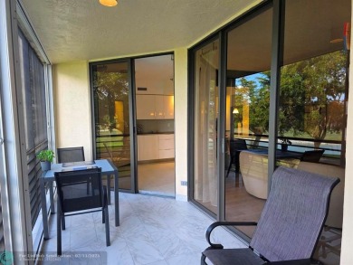 Gorgeous Spacious Remodeled 1bd +Den, 2ba corner unit in Environ on Inverrary Country Club in Florida - for sale on GolfHomes.com, golf home, golf lot