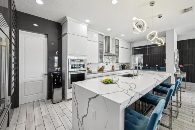 Welcome to 13136 Alderley Drive - a luxurious 5-bedroom, 5-bath on Eagle Creek Golf Club in Florida - for sale on GolfHomes.com, golf home, golf lot