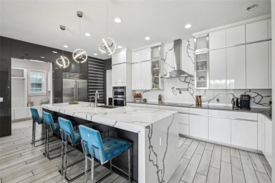 Welcome to 13136 Alderley Drive - a luxurious 5-bedroom, 5-bath on Eagle Creek Golf Club in Florida - for sale on GolfHomes.com, golf home, golf lot