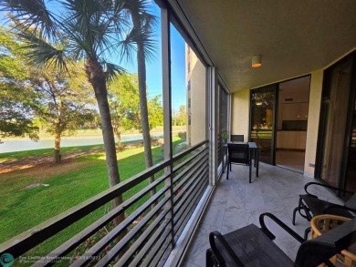 Gorgeous Spacious Remodeled 1bd +Den, 2ba corner unit in Environ on Inverrary Country Club in Florida - for sale on GolfHomes.com, golf home, golf lot