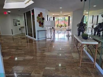 Gorgeous Spacious Remodeled 1bd +Den, 2ba corner unit in Environ on Inverrary Country Club in Florida - for sale on GolfHomes.com, golf home, golf lot