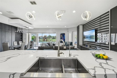 Welcome to 13136 Alderley Drive - a luxurious 5-bedroom, 5-bath on Eagle Creek Golf Club in Florida - for sale on GolfHomes.com, golf home, golf lot