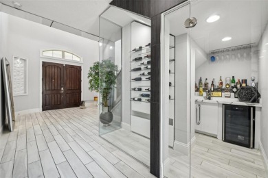 Welcome to 13136 Alderley Drive - a luxurious 5-bedroom, 5-bath on Eagle Creek Golf Club in Florida - for sale on GolfHomes.com, golf home, golf lot
