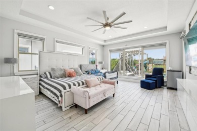 Welcome to 13136 Alderley Drive - a luxurious 5-bedroom, 5-bath on Eagle Creek Golf Club in Florida - for sale on GolfHomes.com, golf home, golf lot