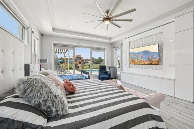 Welcome to 13136 Alderley Drive - a luxurious 5-bedroom, 5-bath on Eagle Creek Golf Club in Florida - for sale on GolfHomes.com, golf home, golf lot
