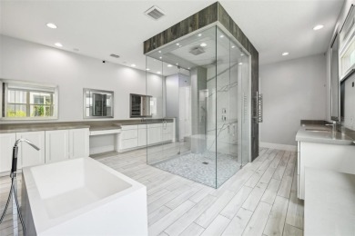 Welcome to 13136 Alderley Drive - a luxurious 5-bedroom, 5-bath on Eagle Creek Golf Club in Florida - for sale on GolfHomes.com, golf home, golf lot
