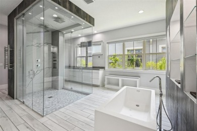 Welcome to 13136 Alderley Drive - a luxurious 5-bedroom, 5-bath on Eagle Creek Golf Club in Florida - for sale on GolfHomes.com, golf home, golf lot