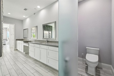 Welcome to 13136 Alderley Drive - a luxurious 5-bedroom, 5-bath on Eagle Creek Golf Club in Florida - for sale on GolfHomes.com, golf home, golf lot