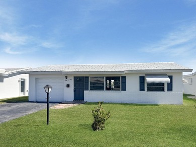 Welcome to 514 SW 20th Street in Palm Beach Leisureville on Leisureville Community Golf Course in Florida - for sale on GolfHomes.com, golf home, golf lot