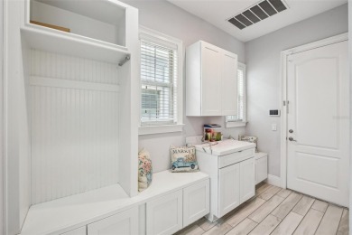 Welcome to 13136 Alderley Drive - a luxurious 5-bedroom, 5-bath on Eagle Creek Golf Club in Florida - for sale on GolfHomes.com, golf home, golf lot