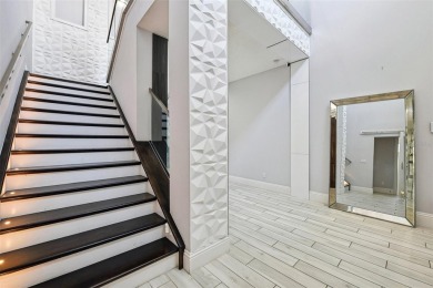 Welcome to 13136 Alderley Drive - a luxurious 5-bedroom, 5-bath on Eagle Creek Golf Club in Florida - for sale on GolfHomes.com, golf home, golf lot