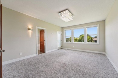 Welcome to this stunning, like-new, custom-built walkout on The Wilds Golf Club in Minnesota - for sale on GolfHomes.com, golf home, golf lot