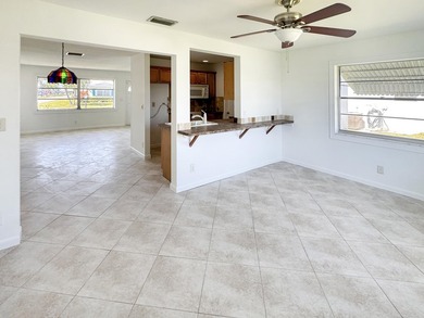 Welcome to 514 SW 20th Street in Palm Beach Leisureville on Leisureville Community Golf Course in Florida - for sale on GolfHomes.com, golf home, golf lot