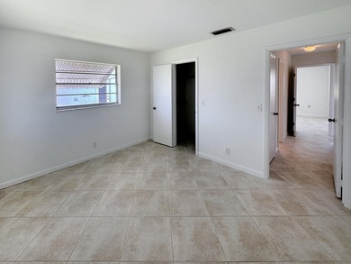 Welcome to 514 SW 20th Street in Palm Beach Leisureville on Leisureville Community Golf Course in Florida - for sale on GolfHomes.com, golf home, golf lot