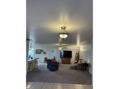 First time on the market. Nicely maintained home across from on Tierra Del Sol Golf Course in New Mexico - for sale on GolfHomes.com, golf home, golf lot