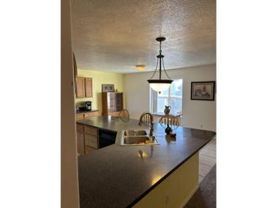 First time on the market. Nicely maintained home across from on Tierra Del Sol Golf Course in New Mexico - for sale on GolfHomes.com, golf home, golf lot