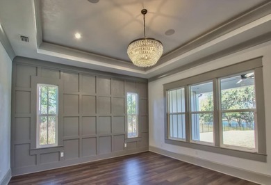 *Photos are of model homes. Actual home proposed construction on Golden Eagle Country Club in Florida - for sale on GolfHomes.com, golf home, golf lot