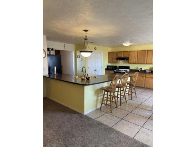 First time on the market. Nicely maintained home across from on Tierra Del Sol Golf Course in New Mexico - for sale on GolfHomes.com, golf home, golf lot