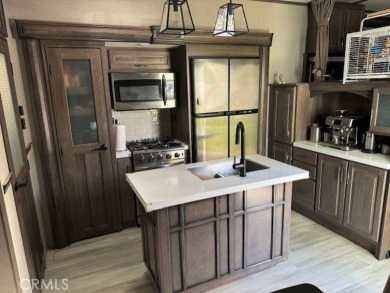 Great Curb Appeal with Golf Cart Parking and huge Build-Out with on Rancho California RV Resort in California - for sale on GolfHomes.com, golf home, golf lot