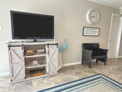 Discover the ultimate in resort living with this ground floor on Edgewater Beach Resort in Florida - for sale on GolfHomes.com, golf home, golf lot