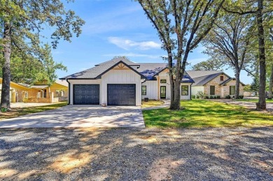 Welcome to your dream waterfront home, built in 2022, where on Lake Kiowa Golf Course in Texas - for sale on GolfHomes.com, golf home, golf lot