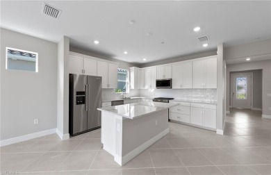 Welcome to this beautifully upgraded single-family home on River Hall Country Club in Florida - for sale on GolfHomes.com, golf home, golf lot