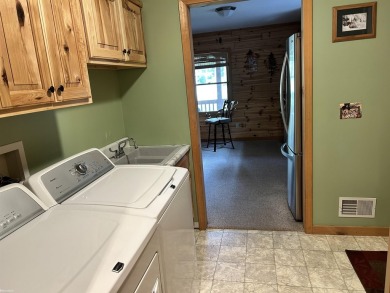 Charming 2 bedroom, 2 bath, 1,120 sq ft ranch home nestled on 3 on Garland Resort and Golf Club  in Michigan - for sale on GolfHomes.com, golf home, golf lot