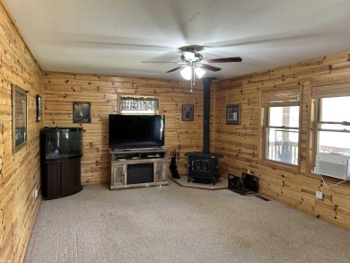 Charming 2 bedroom, 2 bath, 1,120 sq ft ranch home nestled on 3 on Garland Resort and Golf Club  in Michigan - for sale on GolfHomes.com, golf home, golf lot