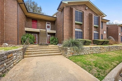 Welcome to this beautifully updated condo nestled in a serene on Stevens Park Golf Course in Texas - for sale on GolfHomes.com, golf home, golf lot