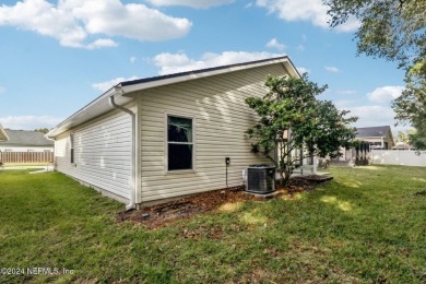 Welcome to this delightful 3-bed, 2-bath home located in the on Golf Club At Fleming Island in Florida - for sale on GolfHomes.com, golf home, golf lot