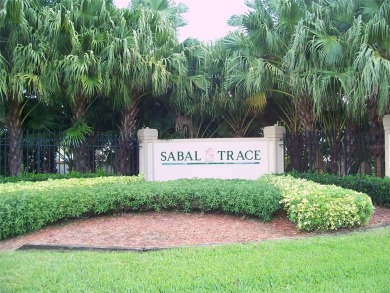 A beautifully maintained, TURNKEY furnished, 2 bedroom, 2 bath on Sabal Trace Golf and Country Club in Florida - for sale on GolfHomes.com, golf home, golf lot