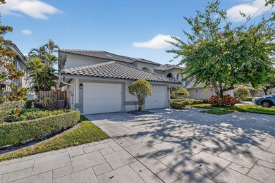 Lovely 2 bedroom, 2 bath residence with soaring vaulted ceilings on Indian Spring Golf and Country Club in Florida - for sale on GolfHomes.com, golf home, golf lot