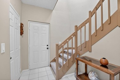 Lovely 2 bedroom, 2 bath residence with soaring vaulted ceilings on Indian Spring Golf and Country Club in Florida - for sale on GolfHomes.com, golf home, golf lot