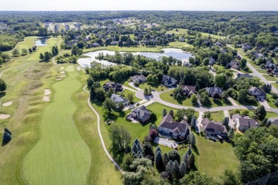 Immaculate Polo Fields home with first-floor primary suite and on Polo Fields Golf and Country Club in Michigan - for sale on GolfHomes.com, golf home, golf lot