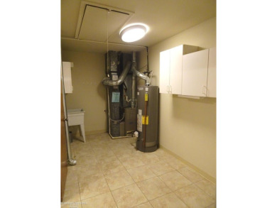 END YOUR SEARCH HERE! RARE FIND! This Ranch style condo with 1st on St. Clair Shores Country Club in Michigan - for sale on GolfHomes.com, golf home, golf lot