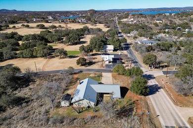 101 W. Bluebonnet Rd is located across the street from the #3 on Blue Lake Golf Club in Texas - for sale on GolfHomes.com, golf home, golf lot