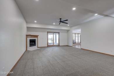 What a transformation on this recent 2024 remodel of a classic on Carthage Municipal Golf Course in Missouri - for sale on GolfHomes.com, golf home, golf lot