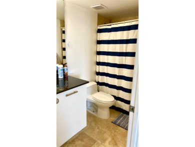 his bright 2 Bedroom, 2 Bathroom plus DEN, corner apartment on Turnberry Isle Resort and Club in Florida - for sale on GolfHomes.com, golf home, golf lot