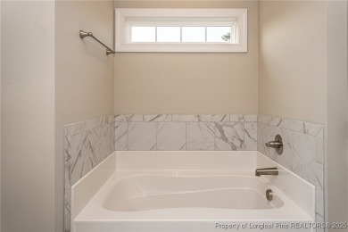 Brand New Custom Home in Gates Four - Move-In Ready!

Welcome to on Gates Four Golf and Country Club in North Carolina - for sale on GolfHomes.com, golf home, golf lot