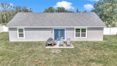 2021 CONCRETE BLOCK STUCCO BUILT HOME WITH 6 FOOT VINYL FENCED on Marion Oaks Country Club in Florida - for sale on GolfHomes.com, golf home, golf lot