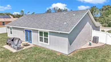 2021 CONCRETE BLOCK STUCCO BUILT HOME WITH 6 FOOT VINYL FENCED on Marion Oaks Country Club in Florida - for sale on GolfHomes.com, golf home, golf lot