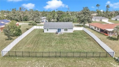 2021 CONCRETE BLOCK STUCCO BUILT HOME WITH 6 FOOT VINYL FENCED on Marion Oaks Country Club in Florida - for sale on GolfHomes.com, golf home, golf lot