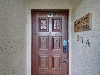 This stunning 2-bedroom unit has been entirely redone and is on Inverrary Country Club in Florida - for sale on GolfHomes.com, golf home, golf lot